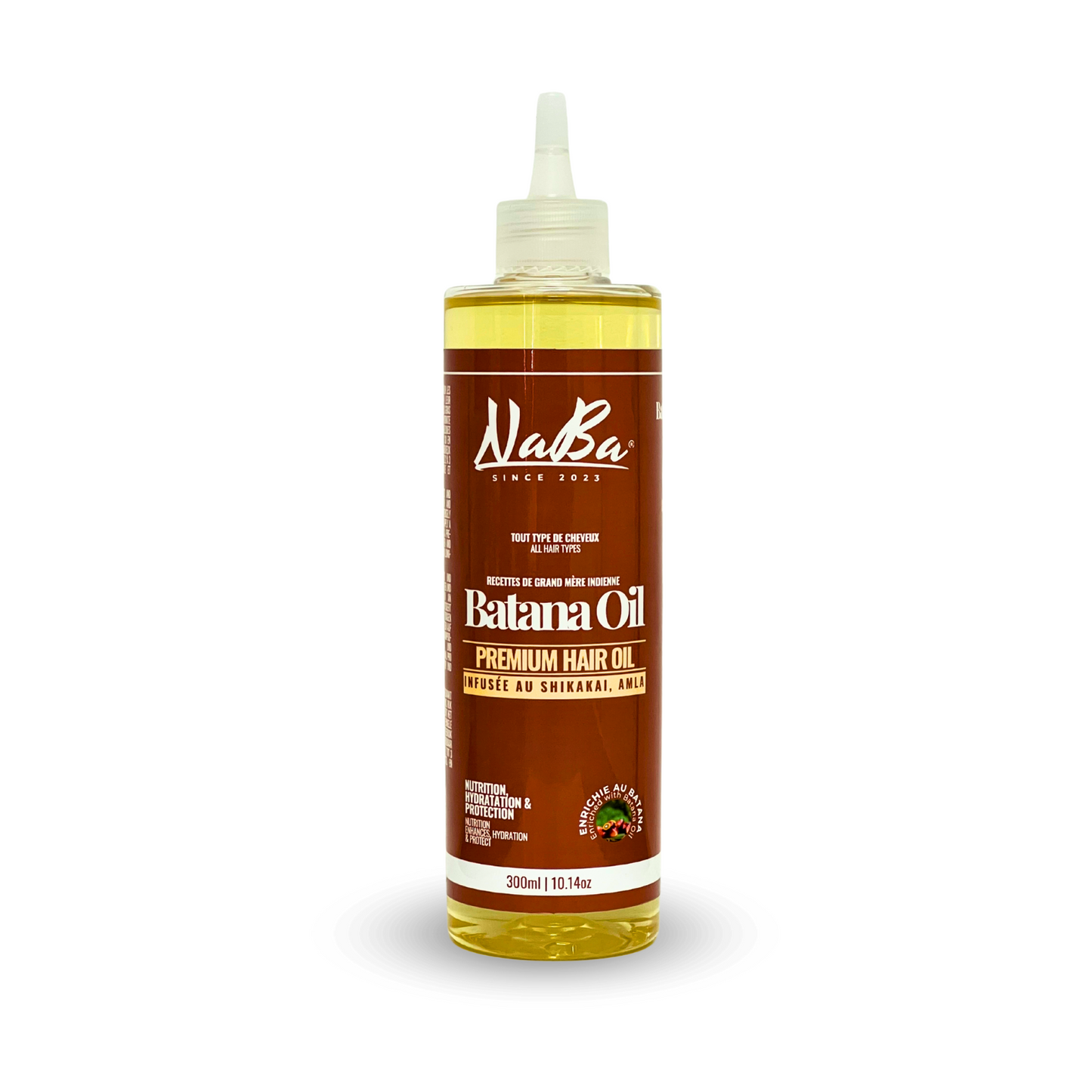 A bottle of Naba Premium Oil Batana hair oil by JS Organics with a label that includes the brand name and product details. The oil is presented in a clear bottle with a white cap.