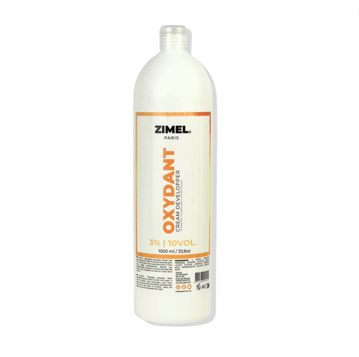 Bottle of Zimel Paris Oxydant Crème 10VOL 1L, by JS Organics. which is a hair coloring product designed for permanent or moderate lightening of white hair.