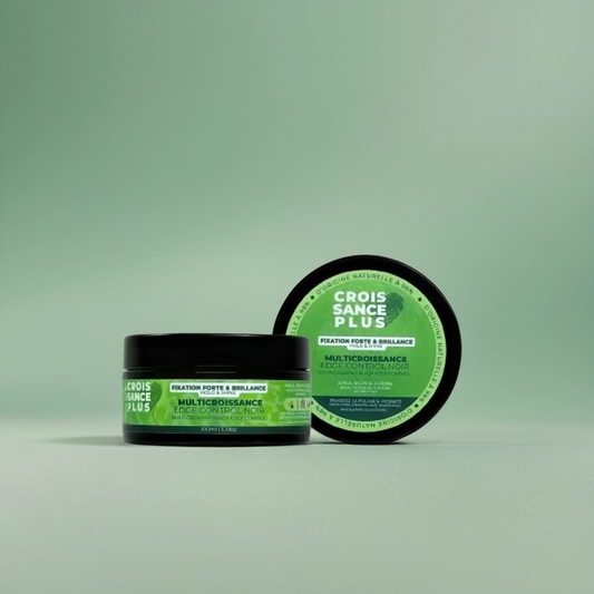 A container of Croissance Plus Multricroissance Edge Control next to its lid by JS Organics, which is displaying product information, on a green background.