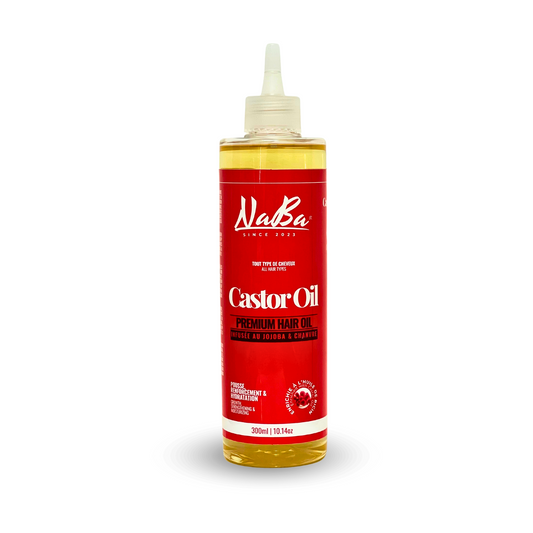 A bottle of Naba Premium Castor Oil by JS Organics with a white label on a red background.