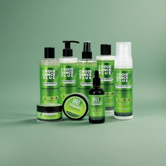 A collection of Croissance Plus hair care products by JS Organics including shampoo, conditioner, detangling spray, styling mousse, and serum, all labeled 'Croissance Plus'.