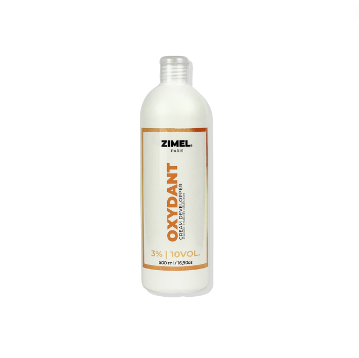 Bottle of Zimel Paris Oxydant Crème 10VOL 500ml, by JS Organics. which is a hair coloring product designed for permanent or moderate lightening of white hair.