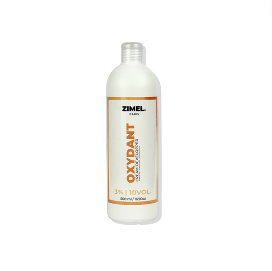 Bottle of Zimel Paris Oxydant Crème 10VOL 500ml, by JS Organics. which is a hair coloring product designed for permanent or moderate lightening of white hair.